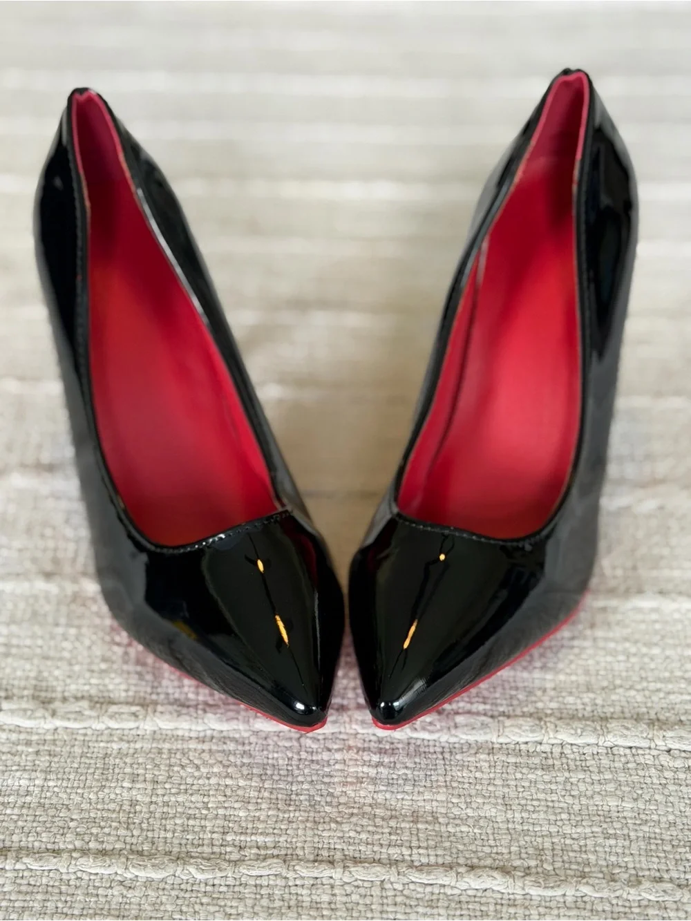 Black Patent Pointed-Toe Pumps with Red Soles